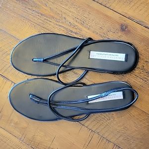 Cavallari black flip flops